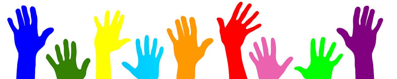 Multi-colored hands reaching upward