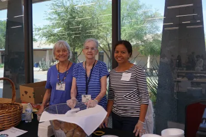 Three community outreach volunteers
